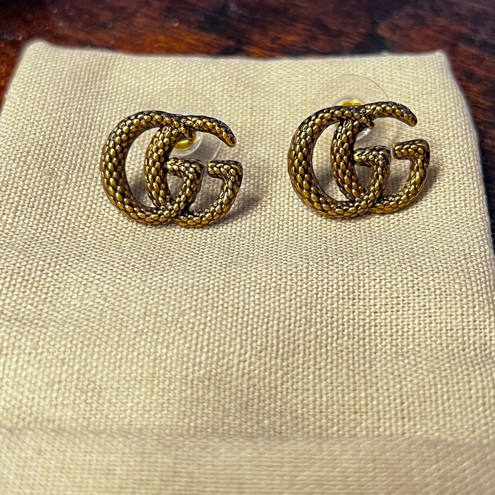 Gucci antique gold  Motif Stud Earrings